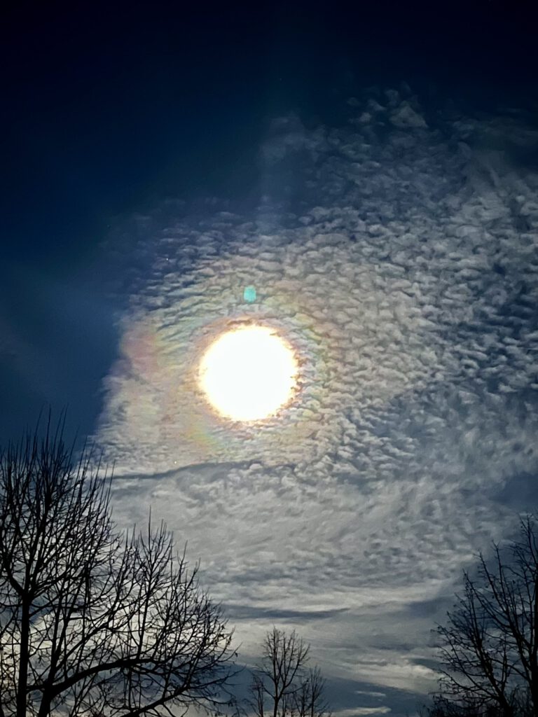 Sonne mit Wolken